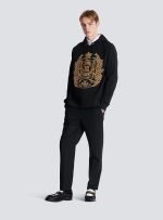 Back view of Balmain embossed hoodie
