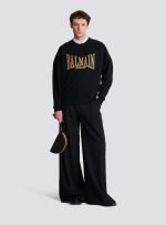 back view of balmain paris black sweatshirt