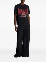 Back view of Balmain logo-print T-shirt showing full rear design and fit shape