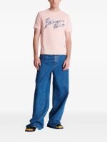 Back view of Balmain printed cotton T-shirts showing rear print detail and cotton fabric fit
