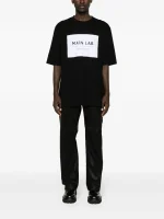 Balmain slogan-patch cotton T-shirt back view plain cotton design and fit
