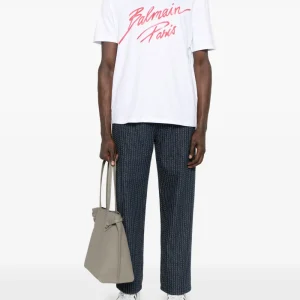 Back view of Balmain Crush Capsule T-shirt showing plain rear design and streetwear silhouette fit