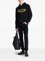 Balmain cotton jeans back view showing rear pocket design and cotton denim fabric detail USA