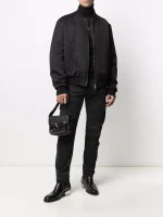 Back view of Balmain-embossed cargo jeans showing rear pocket design and embossed denim detail for casual streetwear outfits