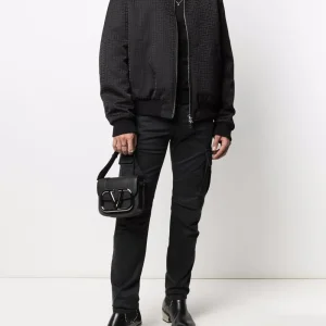 Back view of Balmain-embossed cargo jeans showing rear pocket design and embossed denim detail for casual streetwear outfits
