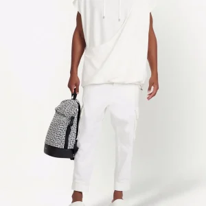 Back view of Balmain tapered leg cargo jeans with tapered streetwear fit