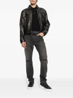 Back view of Balmain distressed finish slim-cut jeans displaying rear pockets, distressed denim texture, slim-cut design, stitching details, and overall back profile.