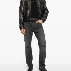 Back view of Balmain distressed finish slim-cut jeans displaying rear pockets, distressed denim texture, slim-cut design, stitching details, and overall back profile.